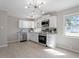 Modern kitchen featuring stainless steel appliances and white cabinetry at 609 E Cockrell St, Nashville, NC 27856