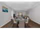 Modern dining room boasts hardwood flooring, access to the outdoor deck, and comfortable seating at 635 Pine Ridge Pl, Raleigh, NC 27609