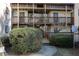 Multi-story apartments with wood siding and a natural wooded landscape at 635 Pine Ridge Pl, Raleigh, NC 27609