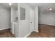 Convenient laundry area with washer, dryer hookups, and access to an open area and utilities at 635 Pine Ridge Pl, Raleigh, NC 27609
