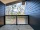 Private balcony overlooking backyard with wooded area at 705 Colleton Rd, Raleigh, NC 27610