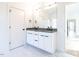 Bathroom with double vanity and modern finishes at 705 Colleton Rd, Raleigh, NC 27610