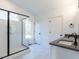 Modern bathroom with double vanity, large shower, and marble floors at 705 Colleton Rd, Raleigh, NC 27610