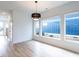 Bright dining area with hardwood floors and large windows at 705 Colleton Rd, Raleigh, NC 27610