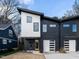 Modern duplex with two-car garage and landscaped yard at 705 Colleton Rd, Raleigh, NC 27610