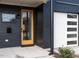 Stylish front door and entryway with modern fixtures at 705 Colleton Rd, Raleigh, NC 27610