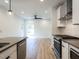 Modern kitchen with stainless steel appliances and an island at 705 Colleton Rd, Raleigh, NC 27610