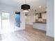 Modern kitchen with stainless steel appliances and a large island at 705 Colleton Rd, Raleigh, NC 27610