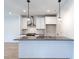 Modern kitchen with stainless steel appliances and an island at 705 Colleton Rd, Raleigh, NC 27610