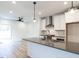 Modern kitchen with stainless steel appliances and an island at 705 Colleton Rd, Raleigh, NC 27610