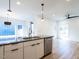 Modern kitchen with stainless steel appliances and an island at 705 Colleton Rd, Raleigh, NC 27610