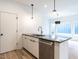 Modern kitchen with stainless steel appliances and an island at 705 Colleton Rd, Raleigh, NC 27610