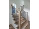 Contemporary staircase leading to the second floor at 705 Colleton Rd, Raleigh, NC 27610