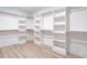 Spacious walk-in closet with ample shelving and hanging space at 705 Colleton Rd, Raleigh, NC 27610