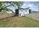 Modern home with fenced backyard and grassy lawn at 707 Colleton Rd, Raleigh, NC 27610
