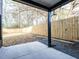 Private backyard with wooden fence and patio at 707 Colleton Rd, Raleigh, NC 27610