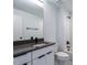Modern bathroom with white subway tile and dark vanity at 707 Colleton Rd, Raleigh, NC 27610