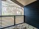 Deck overlooking backyard with trees and privacy fence at 707 Colleton Rd, Raleigh, NC 27610