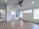 Spacious main bedroom with wood floors and access to balcony at 707 Colleton Rd, Raleigh, NC 27610