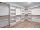 Spacious walk-in closet with ample shelving and hanging space at 707 Colleton Rd, Raleigh, NC 27610