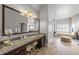 Spa-like bathroom with a large vanity, soaking tub, and walk-in shower at 7112 Hasentree Way, Wake Forest, NC 27587