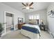 Comfortable bedroom with ensuite bathroom and ceiling fan at 7112 Hasentree Way, Wake Forest, NC 27587