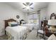 Cozy bedroom with twin beds, a dresser, and plenty of natural light at 7112 Hasentree Way, Wake Forest, NC 27587