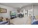 Bonus room with seating area, dining table, and access to bedroom at 7112 Hasentree Way, Wake Forest, NC 27587