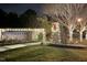 Community entrance with stone pillars and festive holiday decorations at 7112 Hasentree Way, Wake Forest, NC 27587