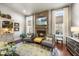Living room with stone fireplace, hardwood floors and comfortable seating at 7112 Hasentree Way, Wake Forest, NC 27587