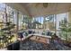 Spacious screened porch overlooking backyard and trees at 7112 Hasentree Way, Wake Forest, NC 27587