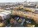 Aerial neighborhood view with surrounding buildings and proximity to local amenities and traffic at 8 Kingston Mill Ct, Durham, NC 27701