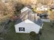 Home exterior showcasing a fenced yard with mature plantings, offering both privacy and space at 8 Kingston Mill Ct, Durham, NC 27701
