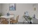 Cozy dining area featuring a table with wicker chairs and neutral paint at 8 Kingston Mill Ct, Durham, NC 27701