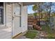 Rear door leading to backyard with deck and partial privacy fence at 8 Kingston Mill Ct, Durham, NC 27701