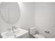 Bathroom featuring a vessel sink, faucet, and a toilet at 804 Heathered Farm Way, Apex, NC 27523