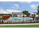 Community pool with comfortable lounge chairs and a splash pad for the  at 804 Heathered Farm Way, Apex, NC 27523