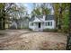 Charming exterior view of a two-story home with black shutters and a front porch at 925 Redgate Ave, Rocky Mount, NC 27801