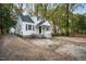Exterior view of a two-story home with black shutters and a front porch at 925 Redgate Ave, Rocky Mount, NC 27801
