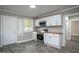 Well-lit kitchen with stainless steel appliances, wood countertop, and a window at 925 Redgate Ave, Rocky Mount, NC 27801