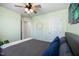 Bedroom with light green walls, a queen bed, and a dream catcher at 104 Ridgeline Ct, Durham, NC 27703
