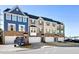 Townhouses with attached garages and landscaping at 104 Ridgeline Ct, Durham, NC 27703