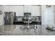 Modern kitchen with granite countertops and stainless steel appliances at 104 Ridgeline Ct, Durham, NC 27703