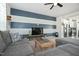 Open concept living room with sectional sofa and kitchen view at 104 Ridgeline Ct, Durham, NC 27703