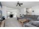 Open concept living room with view of kitchen and stairs at 104 Ridgeline Ct, Durham, NC 27703