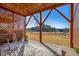 Covered patio with lattice and area rug at 104 Ridgeline Ct, Durham, NC 27703