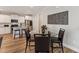 Glass-top dining table with four black leather chairs at 107 York Dr, Oxford, NC 27565