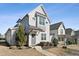 Two-story house with gray siding, landscaping, and walkway at 107 York Dr, Oxford, NC 27565