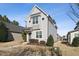 Two-story house with light gray siding, landscaping, and walkway at 107 York Dr, Oxford, NC 27565
