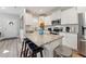 Modern kitchen with white cabinets, granite countertops, and island at 107 York Dr, Oxford, NC 27565